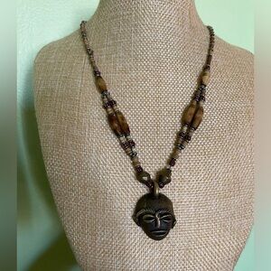 Unusual tribal mask necklace